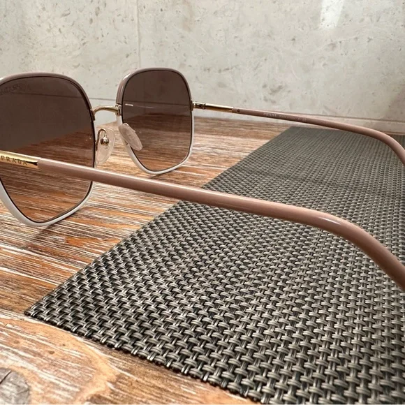 Prada women’s Sunglasses with white & tan frame. - Picture 3 of 7